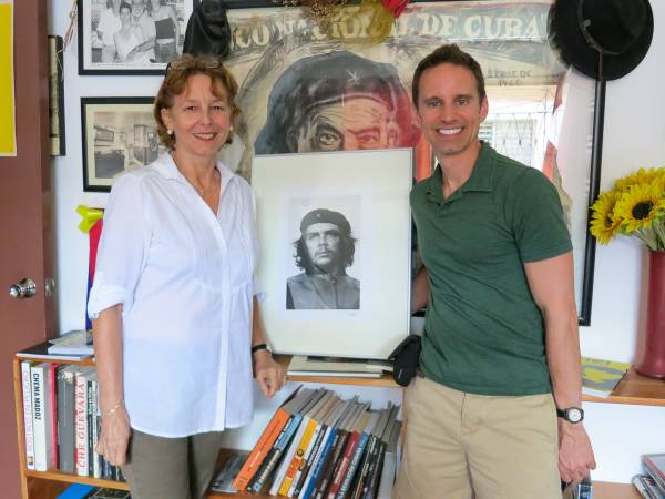 man and woman holding photo