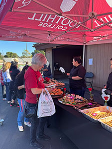 Woman at food table