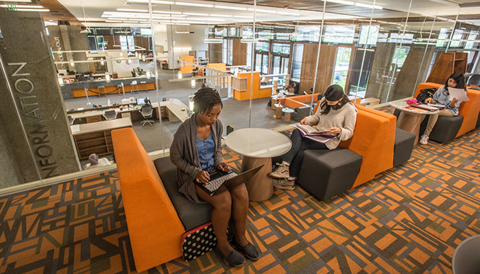 library with 3 students at seats