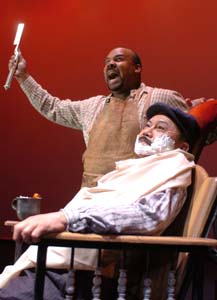 Sweeney Todd (James Monroe Iglehart) prepares to shave a customer (Steve Completory)